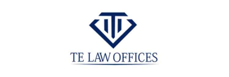 t e law offices logo