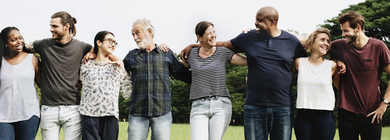 people walk as they hug in community